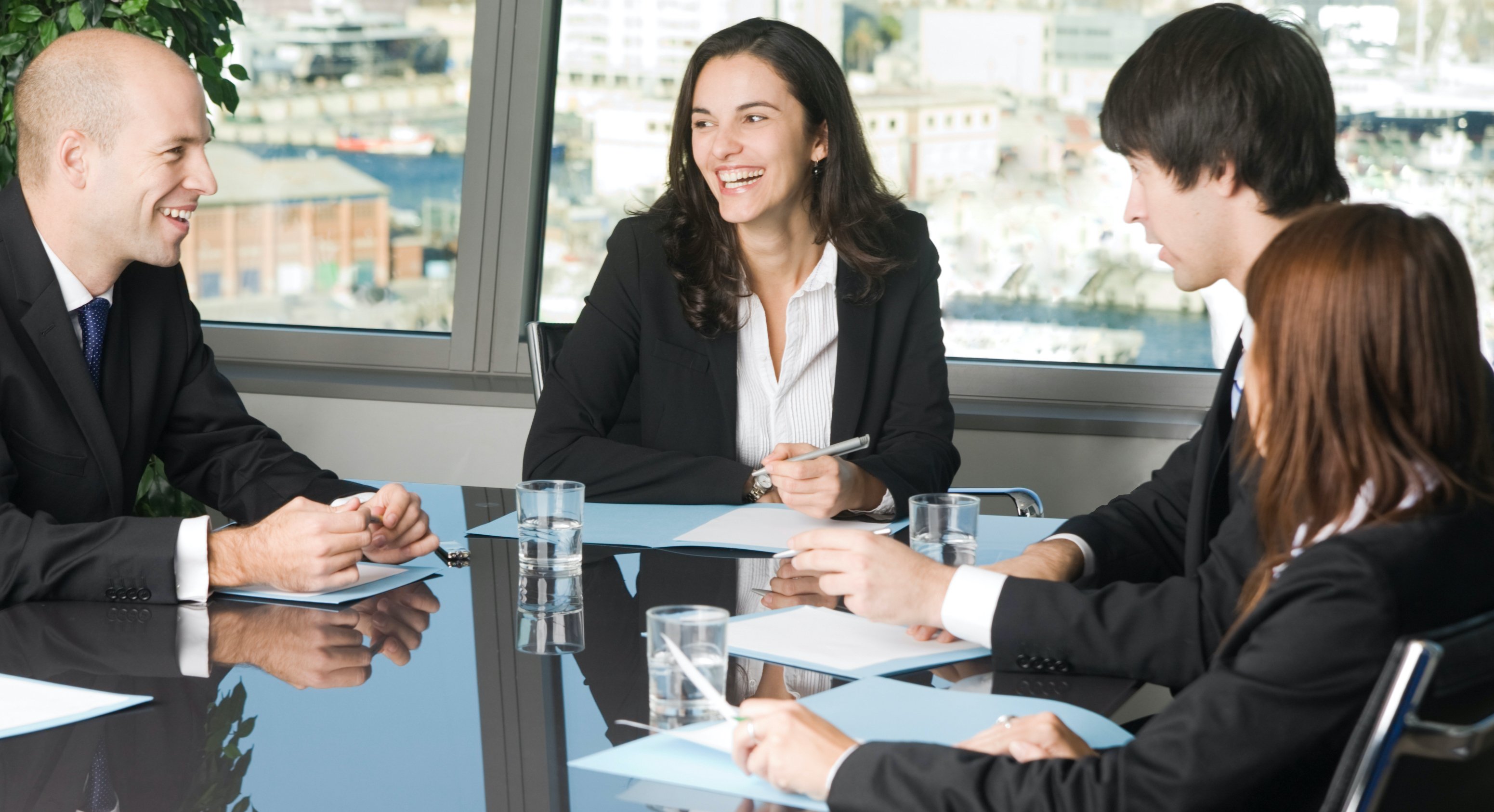 Team of lawyers happily collaborating